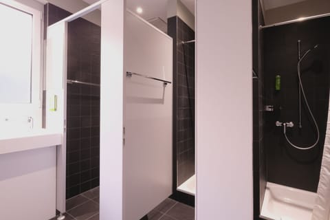 Shower, eco-friendly toiletries, hair dryer, towels