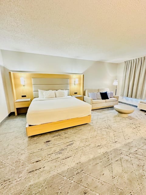 Pillowtop beds, desk, blackout drapes, iron/ironing board