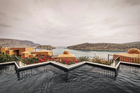 Indoor pool, 4 outdoor pools, open 10:00 AM to 6:00 PM, pool umbrellas