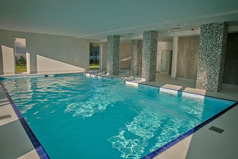 Indoor pool, open 9:00 AM to 10:00 PM, sun loungers