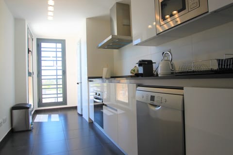 Apartment, 3 Bedrooms, Terrace, Partial Sea View | Private kitchenette | Full-size fridge, microwave, oven, stovetop