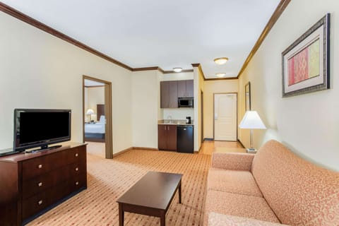 Premium bedding, pillowtop beds, desk, blackout drapes