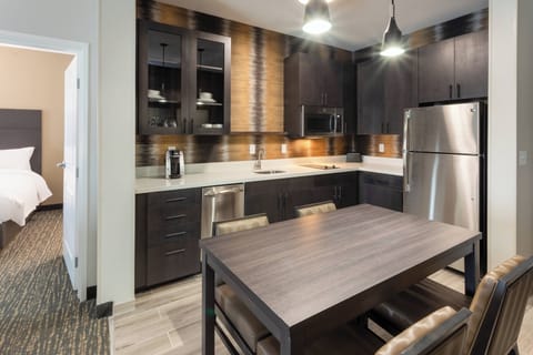 Desk, laptop workspace, iron/ironing board, free cribs/infant beds