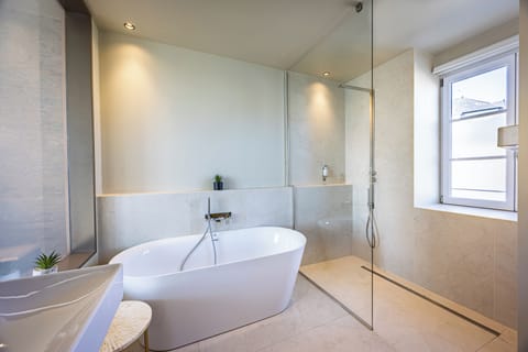 Luxury Suite, Multiple Beds, Sea View | Bathroom | Free toiletries, hair dryer, bathrobes, slippers