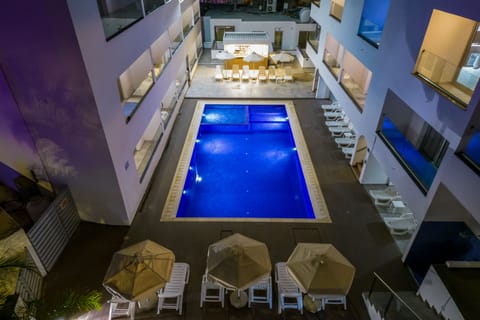 Outdoor pool, open 10:00 AM to 6 PM, pool umbrellas, sun loungers