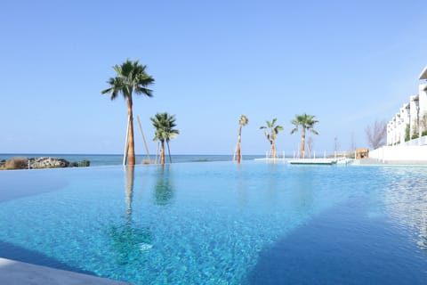 2 outdoor pools, sun loungers