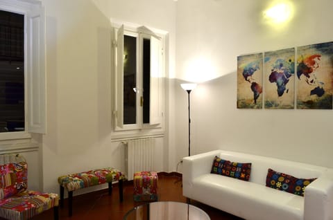 Basic Apartment, 3 Bedrooms | Living room | Flat-screen TV