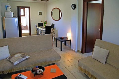 Apartment, 1 Bedroom | Living area | Flat-screen TV