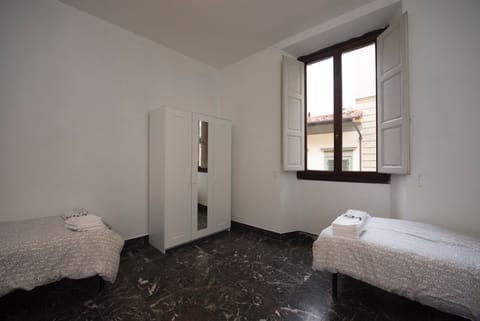 Basic Apartment, 2 Bedrooms | 1 bedroom, desk, iron/ironing board, cribs/infant beds
