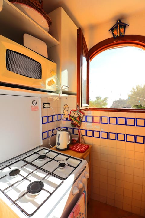 House, 1 Bedroom, Smoking, Terrace | Private kitchen | Fridge, microwave, espresso maker, electric kettle