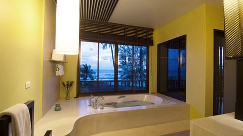 Suite, 1 King Bed, Sea View | Bathroom | Eco-friendly toiletries, hair dryer, bathrobes, slippers