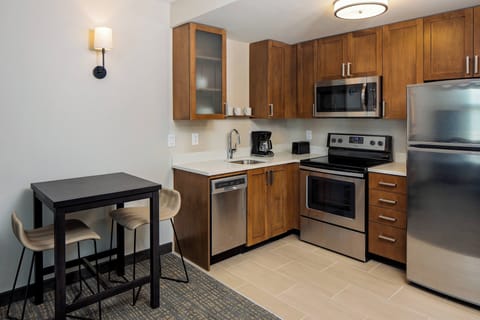 Suite, 1 Bedroom | Private kitchen | Full-size fridge, microwave, stovetop, coffee/tea maker