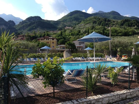 Seasonal outdoor pool, pool umbrellas, sun loungers