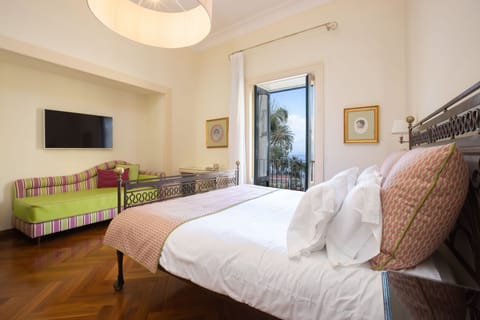 Junior Suite (French balcony) | Minibar, in-room safe, individually decorated, desk