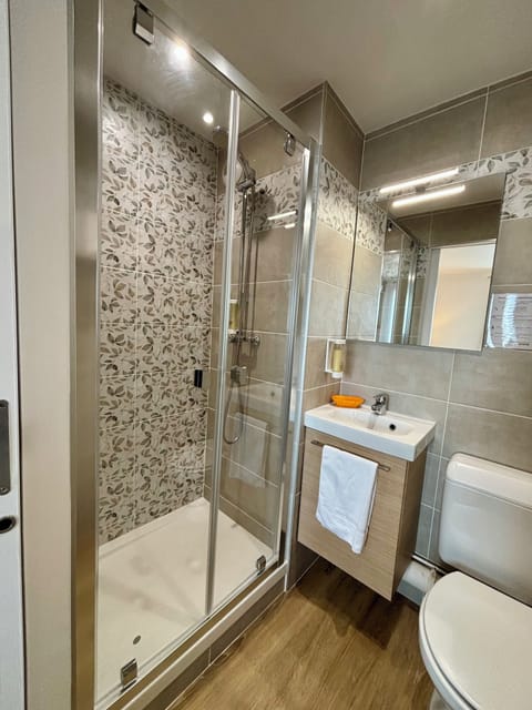 Shower, free toiletries, hair dryer, towels