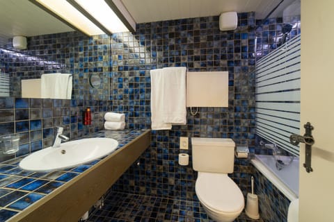 Double Room (Säntis) | Bathroom | Combined shower/tub, deep soaking tub, hair dryer, towels