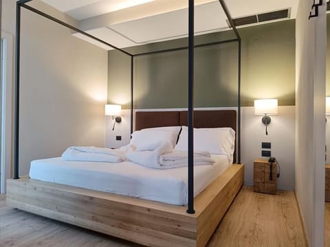 Family Triple Room, Balcony | In-room safe, desk, laptop workspace, free WiFi