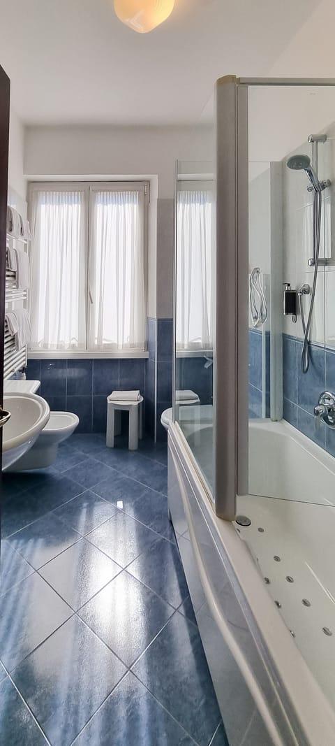 Double Room, 1 Large Twin Bed | Bathroom | Shower, hair dryer, slippers, bidet