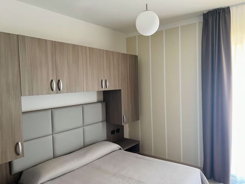 Basic Double Room, 1 Double Bed, Balcony, Partial Lake View | In-room safe, desk, laptop workspace, free WiFi