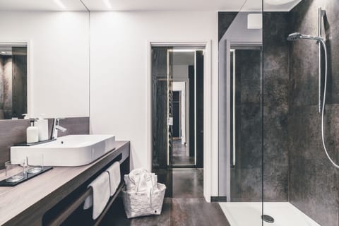 Eco-friendly toiletries, hair dryer, bathrobes, slippers