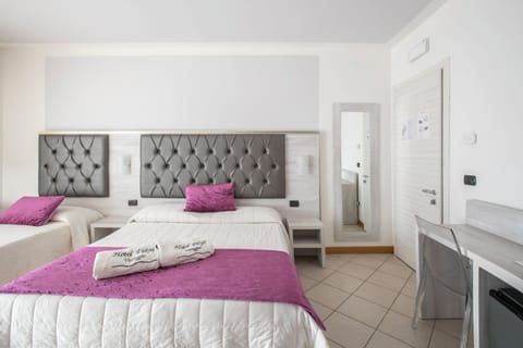 Triple Room, Balcony, Ocean View | Memory foam beds, minibar, in-room safe, desk