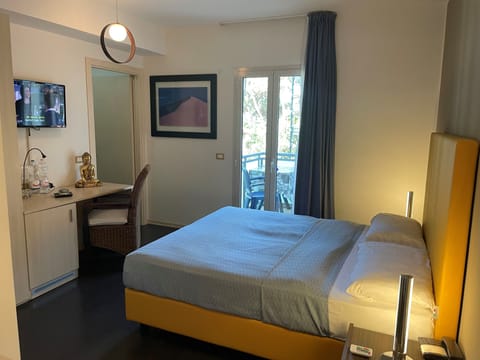 Family Room, Connecting Rooms (3 Adults) | Minibar, in-room safe, desk, cribs/infant beds