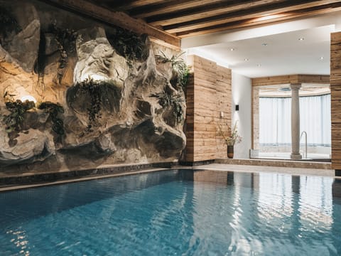 Indoor pool, outdoor pool, pool umbrellas, sun loungers