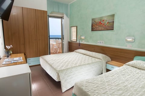 Triple Room, Multiple Beds | Minibar, in-room safe, desk, free WiFi