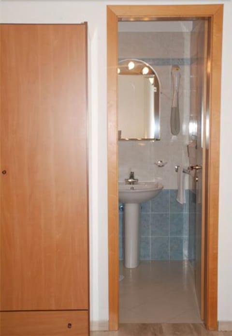 Hair dryer, bathrobes, bidet, towels