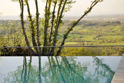 Outdoor pool, open 9:00 AM to 7 PM, pool umbrellas, sun loungers