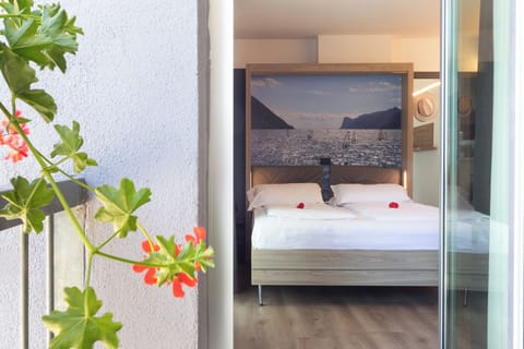 Basic Studio | Minibar, desk, laptop workspace, blackout drapes