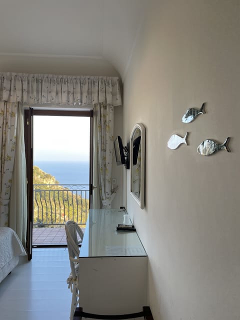Double Room, Terrace, Sea View | Frette Italian sheets, memory foam beds, minibar, in-room safe