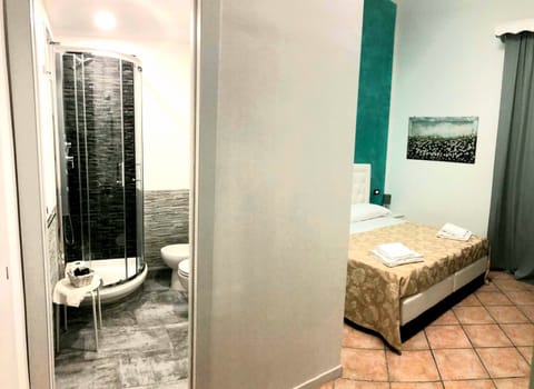 Comfort Double Room | Minibar, desk, laptop workspace, blackout drapes