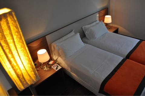 Select Comfort beds, minibar, in-room safe, desk