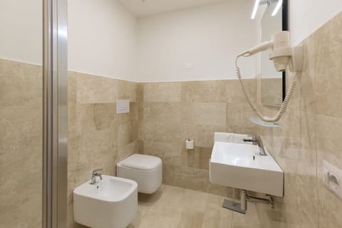 Standard Double or Twin Room, 1 Bedroom | Bathroom | Shower, free toiletries, bidet, towels