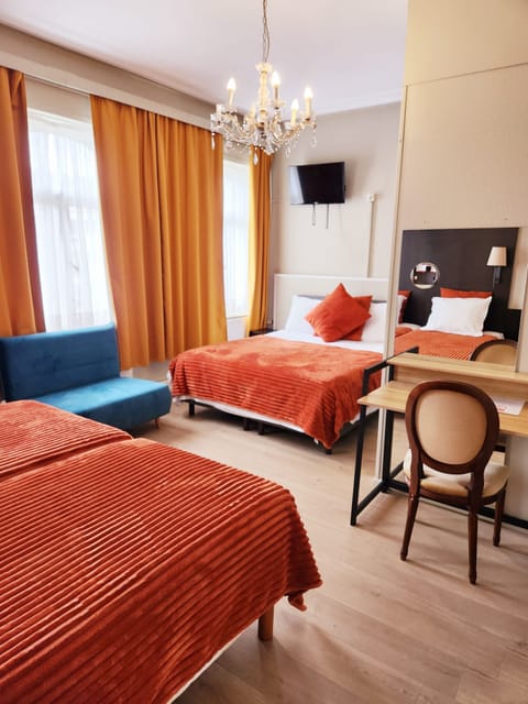 Family Room | Premium bedding, blackout drapes, free WiFi, bed sheets