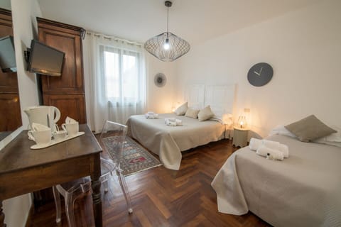 Double Room | Minibar, desk, laptop workspace, iron/ironing board