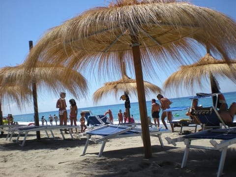 Private beach nearby, beach shuttle, sun loungers, beach umbrellas