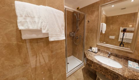 Suite, Sea View (beach access included) | Bathroom | Hair dryer, slippers, bidet, towels
