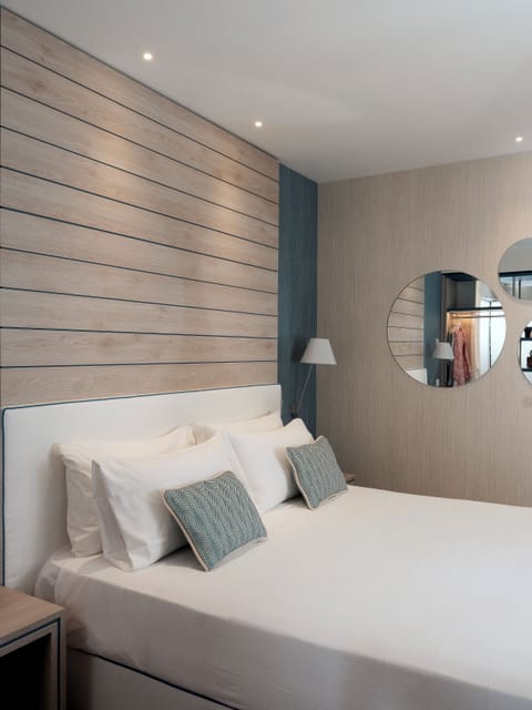 Comfort Room, Balcony, City View | In-room safe, desk, blackout drapes, iron/ironing board