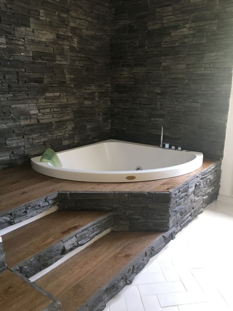 Deluxe Suite, Sea View | Bathroom | Shower, hair dryer, bathrobes, slippers