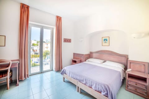 Quadruple Room, Balcony | Minibar, in-room safe, desk, free WiFi