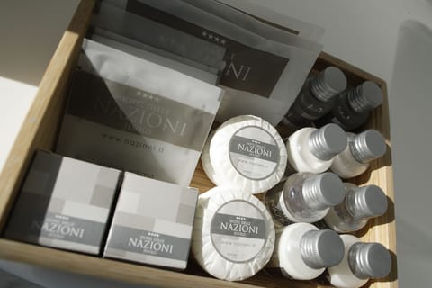 Shower, free toiletries, hair dryer, slippers