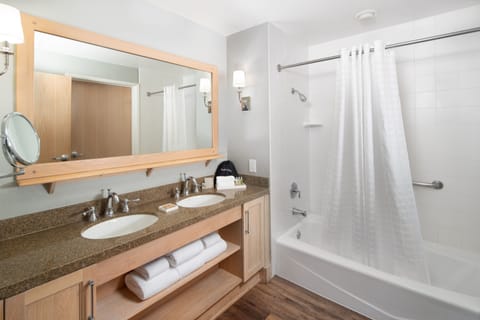 Combined shower/tub, hair dryer, towels, soap