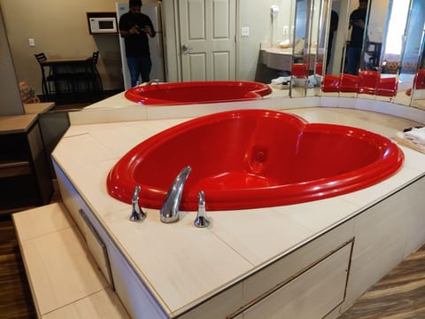 Suite, 1 King Bed, Smoking (Jacuzzi Tub) | Desk, iron/ironing board, free WiFi, bed sheets