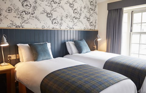 Desk, iron/ironing board, free cribs/infant beds, free rollaway beds