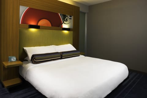 Premium bedding, down comforters, pillowtop beds, in-room safe