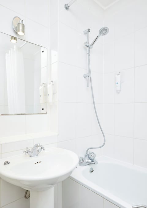 Twin Room | Bathroom | Hair dryer, towels