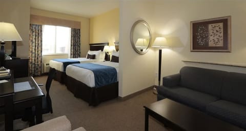 Desk, laptop workspace, iron/ironing board, free cribs/infant beds