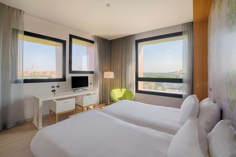 Family Triple Room | Down comforters, minibar, in-room safe, desk